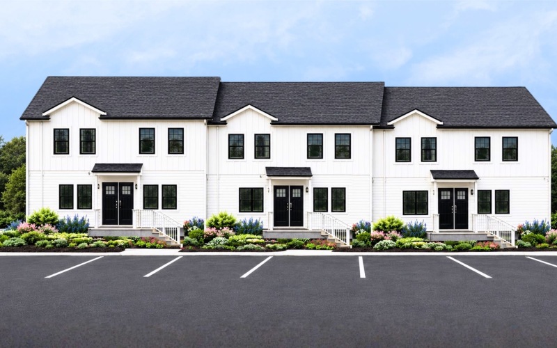 a large building with a parking lot